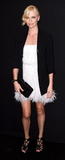 th_07040_celebrity_paradise.com_TheElderCharlizeTheron2011_06_08_CelebratesTheLaunchOfDIORVIIIinNY_24_122_241lo.JPG